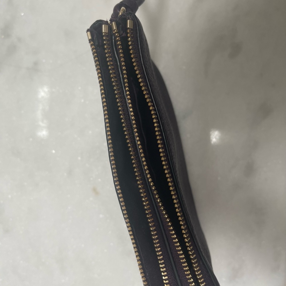 Plum colored coach wristlet - Picture 2 of 3